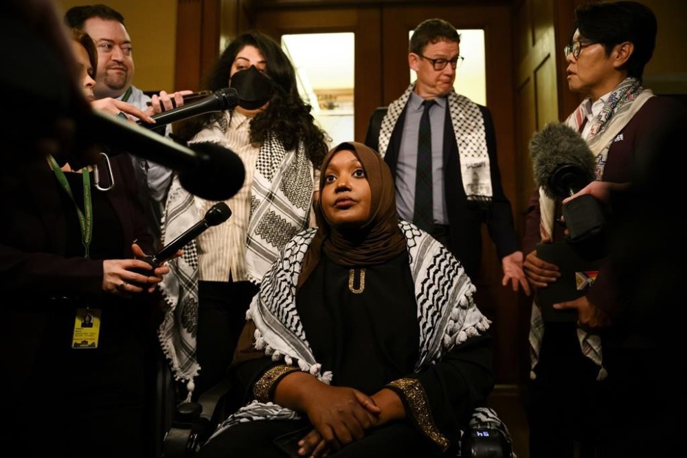 MPP Sarah Jama speaks to press after being asked by the Speaker of the House Ted Arnott to leave the Ontario legislature during question period, in Toronto on Monday, May 6, 2024. THE CANADIAN PRESS/Christopher Katsarov