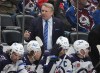 Winnipeg Jets head coach Rick Bowness, center top, directs his team in the second period of Game 4 of an NHL Stanley Cup first-round playoff series against the Colorado Avalanche, Sunday, April 28, 2024, in Denver. (AP Photo/David Zalubowski)