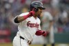 Cleveland Guardians' José Ramírez gestures as he runs to first base after hitting a home run in the sixth inning of a baseball game against the Detroit Tigers, Monday, May 6, 2024, in Cleveland. (AP Photo/Sue Ogrocki)