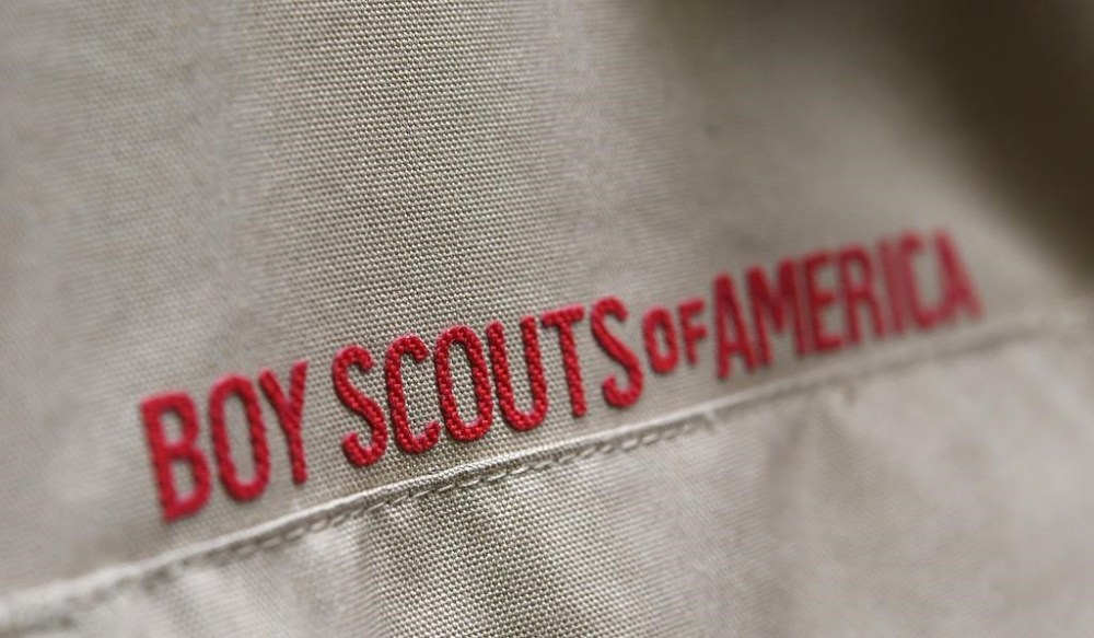 FILE - A Boy Scout uniform is displayed, Feb. 18, 2020, in the retail store at the headquarters for the French Creek Council of the Boy Scouts of America in Summit Township, Erie County, Pa. The U.S. organization, which now welcomes girls into the program and allows them to work toward the coveted Eagle Scout rank, announced Tuesday, May 7, 2024, that it will change its name to Scouting America as it focuses on inclusion. (Christopher Millette/Erie Times-News via AP, File)
