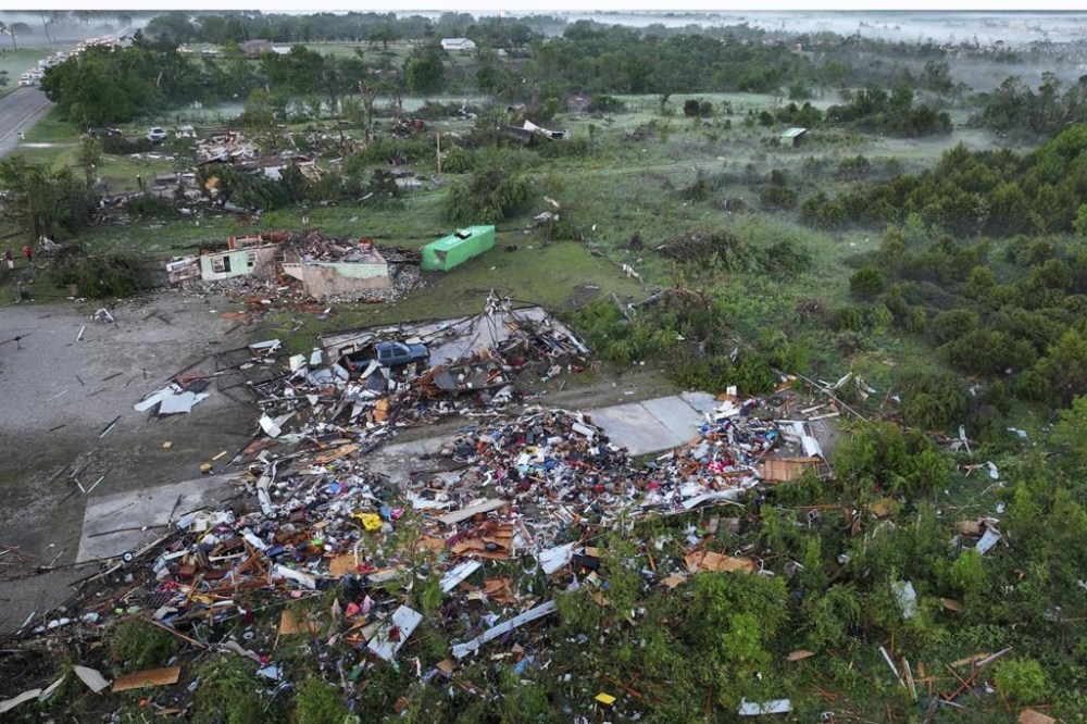 Debris and damage from powerful storms are seen. Tuesday, May 7, 2024 in Barnsdall, Okla. (Mike Simons/Tulsa World via AP)