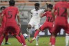 FILE - United States' Keyrol Figueroa, center, battles for the ball against South Korea's Jin Taeho during their FIFA U-17 World Cup Group E soccer match at Jakarta International Stadium in Jakarta, Indonesia, on Nov. 12, 2023. United States youth international Keyrol Figueroa has signed a pro contract with Liverpool, the Premier League club said Tuesday. The 17-year-old Figueroa has impressed since moving to the Merseyside club when he was 14 and has consistently scored at different age levels. Liverpool described him in a statement as a “prolific goalscorer.” (AP Photo/Dita Alangkara)