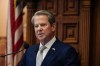 FILE - Georgia Gov. Brian Kemp delivers the State of the State speech, Jan. 11, 2024, in Atlanta. Kemp signed a bill into law Tuesday, May 7, that makes additional changes to Georgia's election laws ahead of the 2024 presidential contest in the battleground state, including defining probable causes for removing voters from the rolls when their eligibility is challenged. (AP Photo/Brynn Anderson, File)