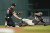 Washington Nationals outfielder Eddie Rosario, right, steals second base from Baltimore Orioles second baseman Jordan Westburg, left, during the seventh inning of a baseball game at Nationals Park in Washington, Tuesday, May 7, 2024. (AP Photo/Susan Walsh)