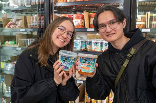 BROOK JONES / FREE PRESS Anastasiia Malynkina and her husband Davyd Tian, who both started Tian&rsquo;s Korean Salads, are pictured showing off their Korean eggplant salad and Korean carrot salad at Young&rsquo;s Market at 2188 McPhillips St., in Winnipeg, Man., Wednesday, March 27,. 2024. The husband and wife duo who immigrated from Ukraine to Winnipeg during the ongoing Russia-Ukraine war started Tian&rsquo;s Korean Salads in February 2024.