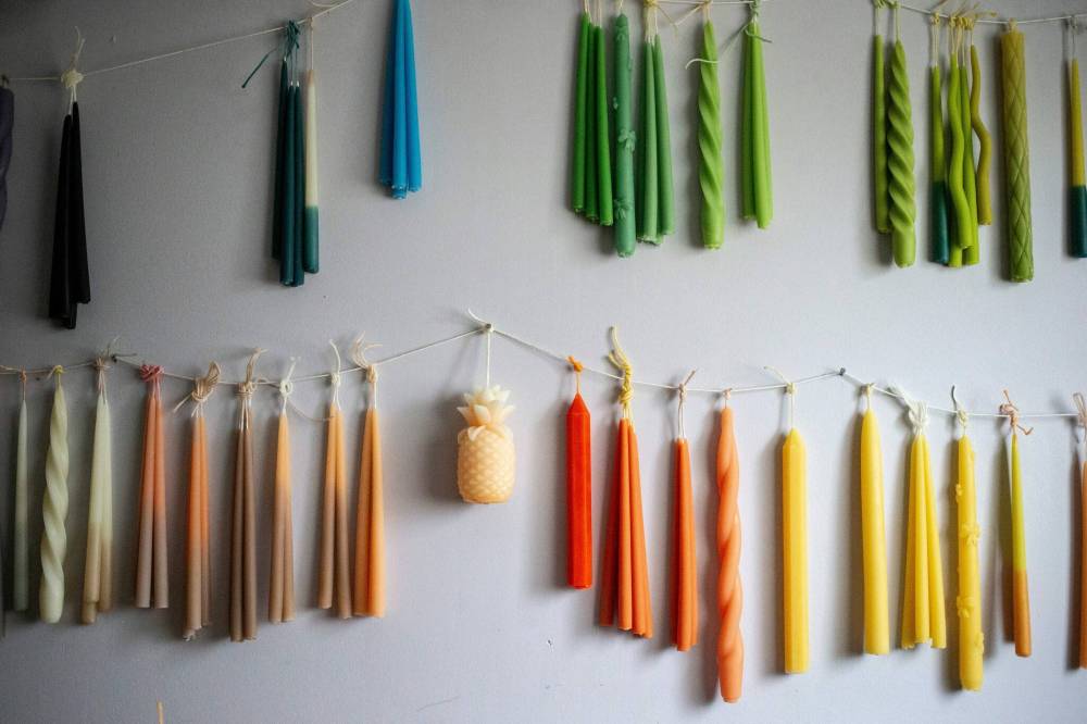 MIKAELA MACKENZIE / FREE PRESS
                                Sable is currently working on a run of 150 candles.