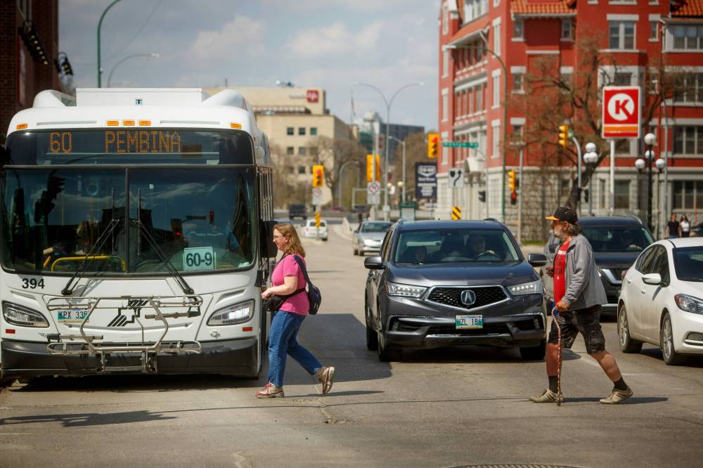 Mike Deal / Free Press Files
                                A recent report recommends against a proposal for the city to add a pedestrian scramble at the intersection of Osborne Street and River Avenue.