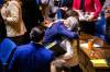 MIKAELA MACKENZIE / FREE PRESS
                                Finance Minister Adrien Sala hugs Families Minister Nahanni Fontaine on budget day Tuesday. Critics say the budget offers little to celebrate regarding climate change.