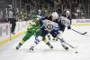Winnipeg Jets defenceman Brenden Dillon, front right, and Minnesota Wild centre Jacob Lucchini, front left, battle for the puck during the third period of an NHL game Saturday, April 6, 2024, in St. Paul, Minn. (AP Photo/Abbie Parr)
