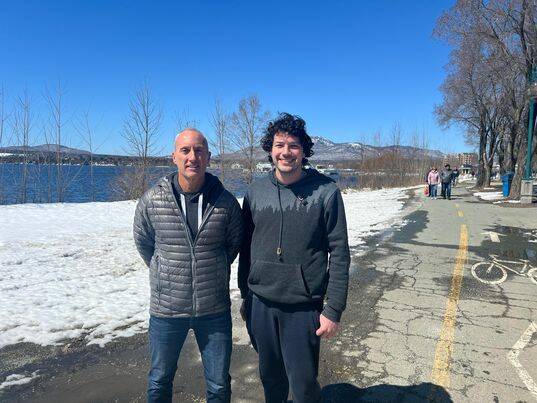 Winnipeg photographers Chris Mason (left) and Ryan Lucenkiw pictured in Magog, QC, amid a days-long road trip to reach the April 8 solar eclipse's 'path of totality.' (Submitted)