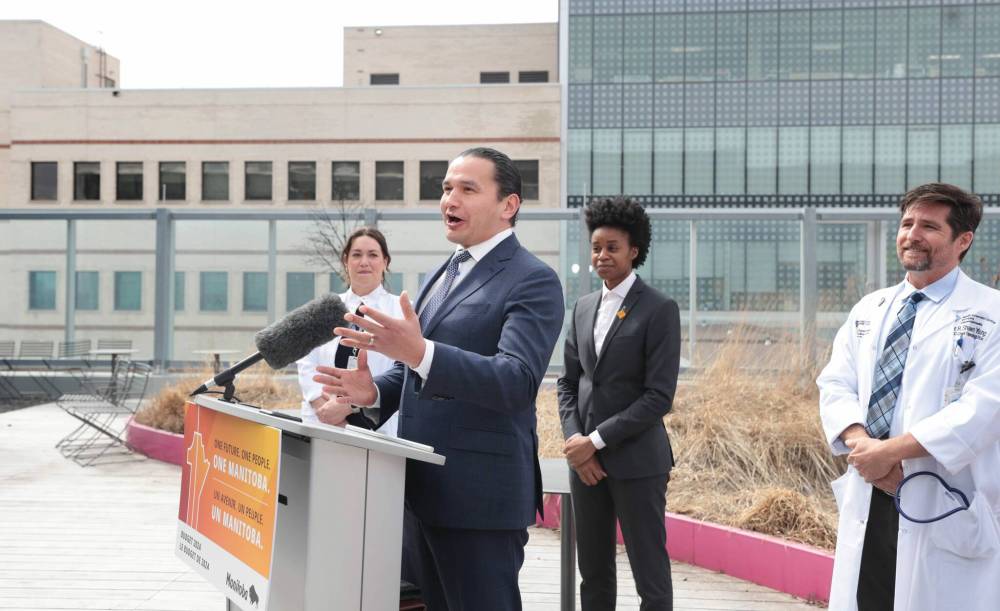 Ruth Bonneville / Free Press
From left: Dr. Manon Pelletier, Premier Wab Kinew, Health Minister Uzoma Asagwara and Dr. Shawn Young at the press conference at the Health Sciences Centre announcing the opening of new hospital beds.