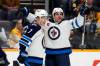 Mark Humphrey / The Associated Press
                                Winnipeg Jets’ Dylan DeMelo, right, celebrates with Vladislav Namestnikov scoring a goal against the Nashville Predators during the first period.