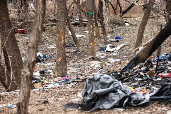 Garbage and traces of prior encampments along the Assiniboine River on Wednesday. (Mikaela MacKenzie / Free Press)