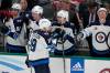 Tony Gutierrez / The Associated Press
                                Winnipeg Jets’ David Gustafsson celebrates with the bench after scoring in the second period in Dallas, Thursday.