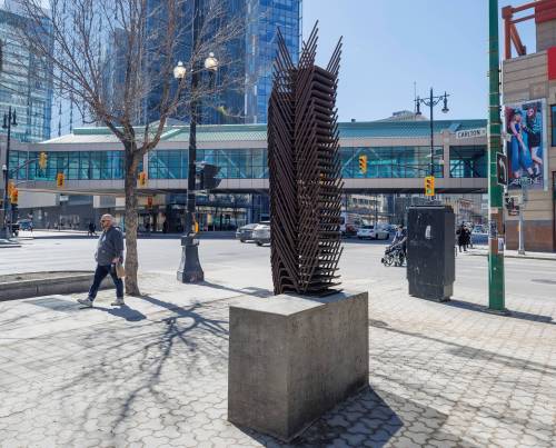 MIKE DEAL / FREE PRESS
                                Made of concrete and weathering steel, O-ween du muh waun was created by artists Rebecca Belmore and Osvaldo Yero in 2018 and is situated in Air Canada Park at 345 Portage Ave.