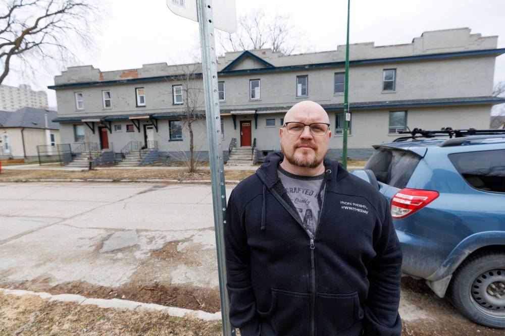 MIKE DEAL / FREE PRESS
Justin Pauls lives down the street from the townhouse building in the 300 block of Arnold Avenue in Fort Rouge.
