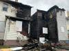 NICOLE BUFFIE / FREE PRESS
                                A home at 560 Mountain Ave. (right) ignited on the evening of April 16 after being boarded up due to a prior blaze on Feb. 2, which gutted the residence and the one next to it (left). Two doors down, a garage lit on fire on April 14 and a man’s body was pulled from the inferno.