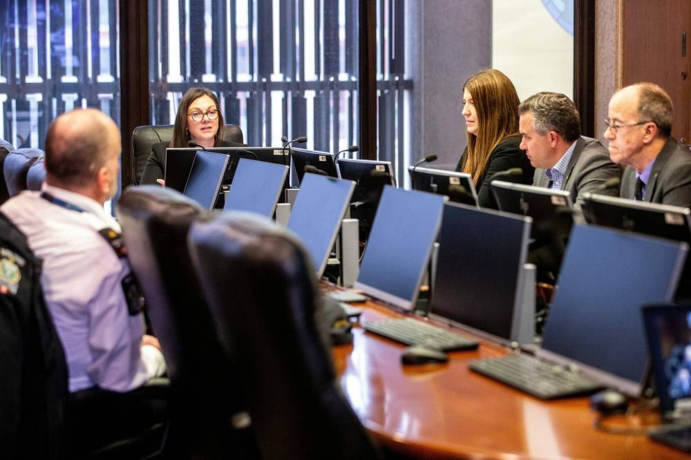 MIKAELA MACKENZIE / FREE PRESS
Chairwoman Sherri Rollins (second from left) promised to seek changes to crack down on properties in disrepair at the property and development committee meeting Monday.