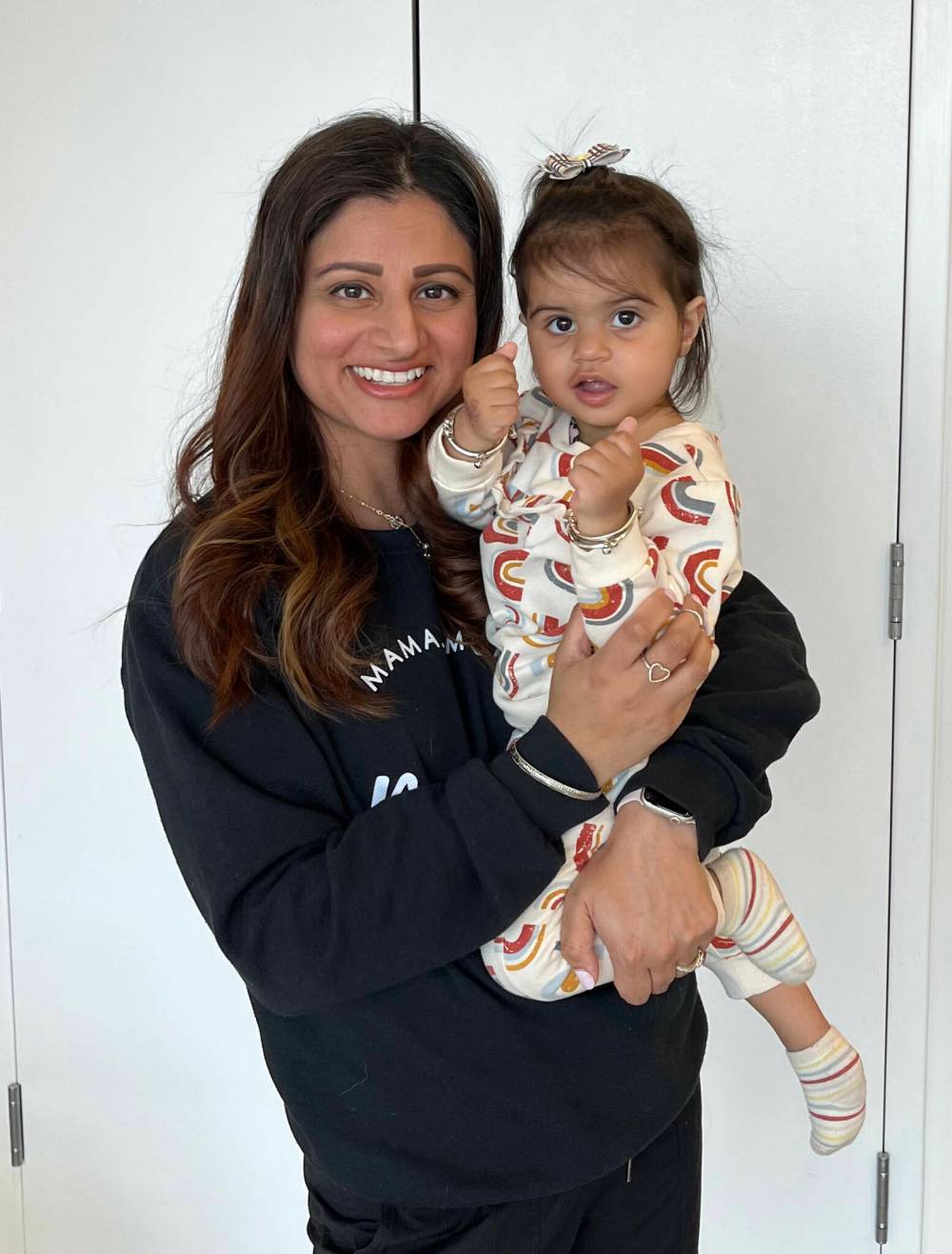GABRIELLE PICHE / FREE PRESS
                                15-month-old Jind shows off her “open-close” hand abilities while in her mother Romie Dhaliwal’s arms after a Lullaland class.