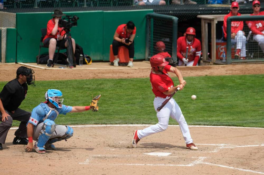 Winnipeg Goldeyes’ Max Murphy (13) takes a swing during a game at Shaw Park in 2023. (Mike Deal / Free Press files)