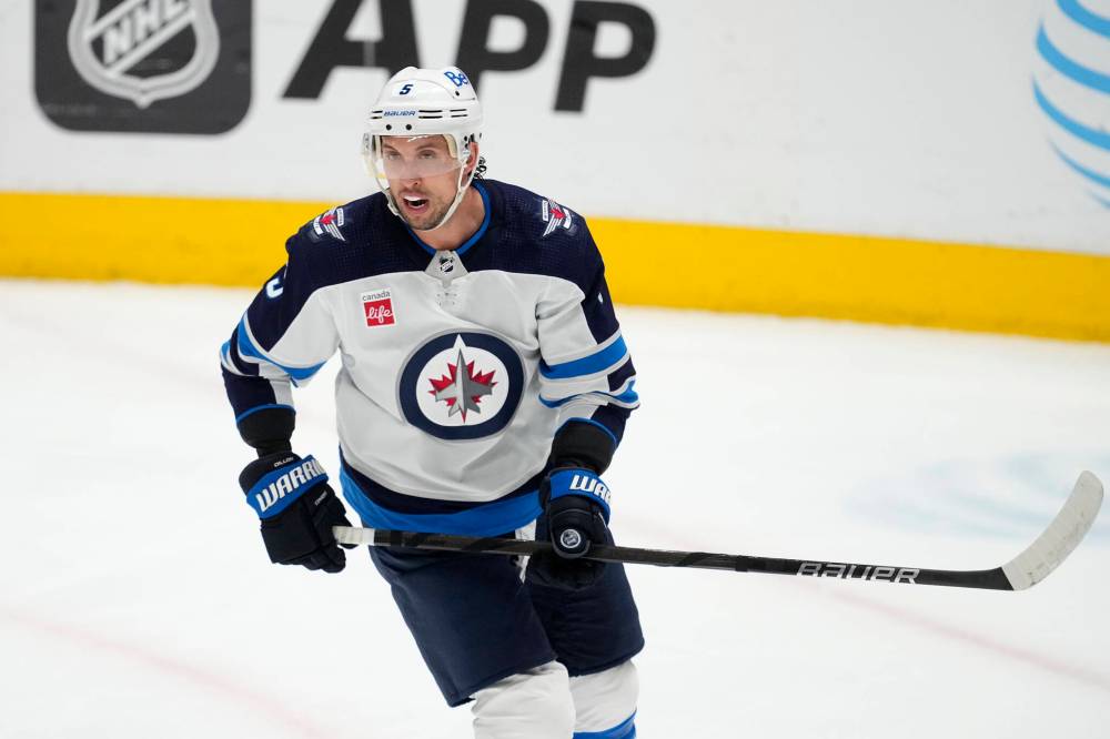 TONY GUTIERREZ / THE CANADIAN PRESS FILES
Winnipeg Jets defenceman Brenden Dillon competes during an NHL hockey game against the Dallas Stars April 11. Jets coach Rick Bowness says Dillon is day-to-day after suffering a hand injury against the Colorado Avalanche Friday night.