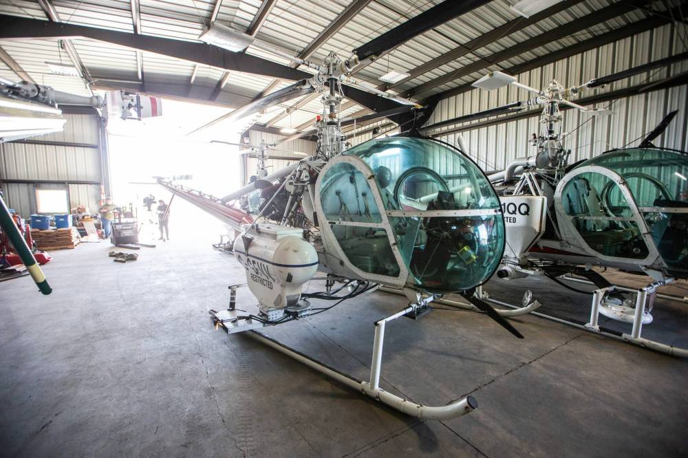 City insect control helicopters are ready to target mosquito larvae. (Mikaela MacKenzie / Free Press)