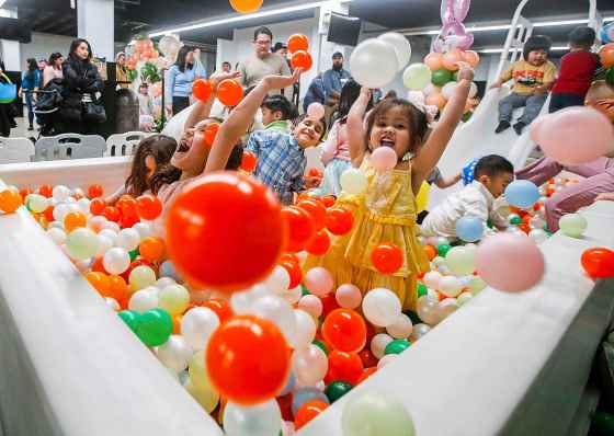 Children play in a ball pit during the 'Easter Eggstravaganza' at Assiniboia Downs on Sunday. Other activities on offer included a scavenger hunt and pictures with Mr. and Mrs. Rabbit. (John Woods / Free Press)