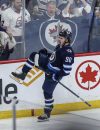 Winnipeg Jets' Nikita Chibrikov (90) celebrates his game-winning goal against the Vancouver Canucks during third period NHL action in Winnipeg on Thursday, April 18, 2024. THE CANADIAN PRESS/John Woods