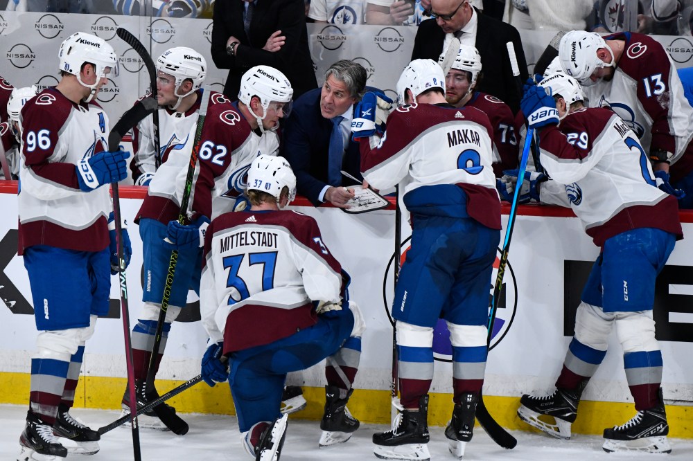 Colorado Avalanche head coach Jared Bednar speaks to his players during a timeout against the Winnipeg Jets during the third period. (Fred Greenslade / The Canadian Press)