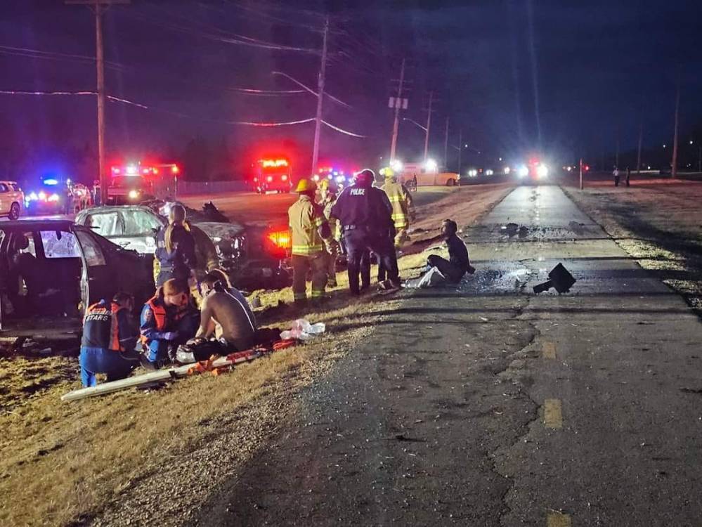 Five hurt in crash, drivers might have been racing or chasing each