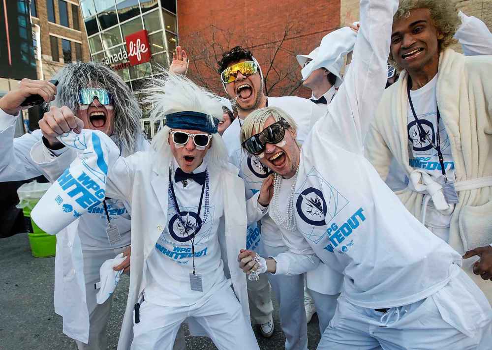 JOHN WOODS / FREE PRESS
Jets fans at the Whiteout party Sunday.