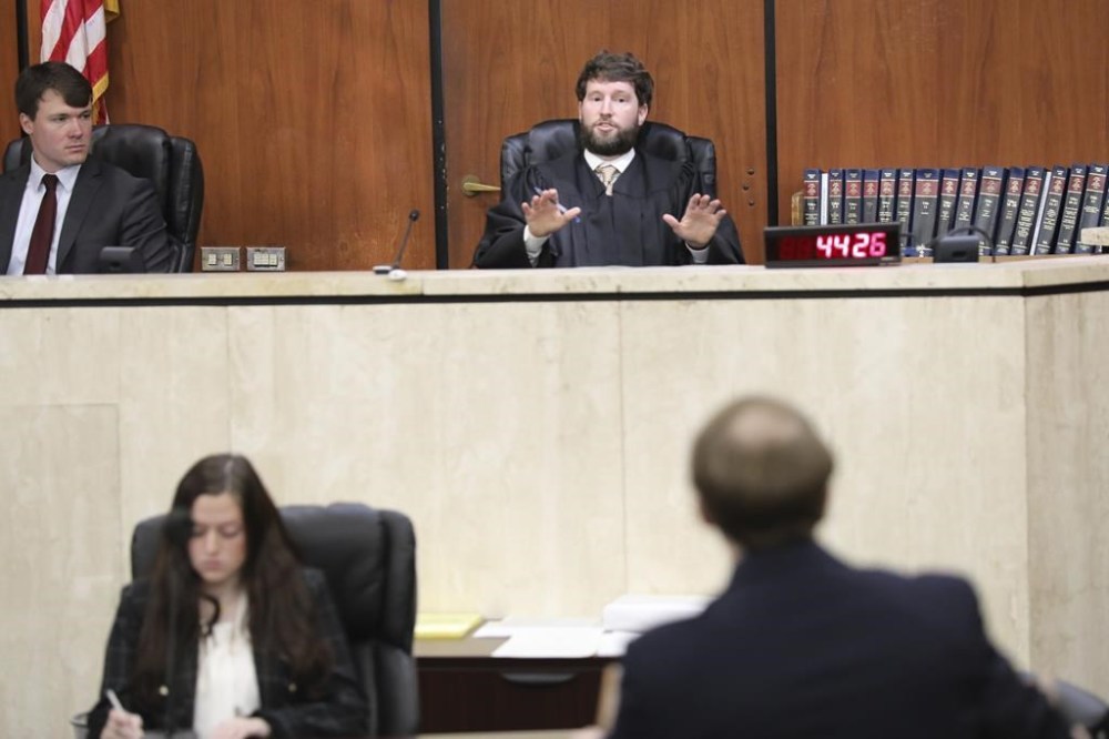 South Carolina Circuit Judge Daniel Coble listens to arguments on how do define