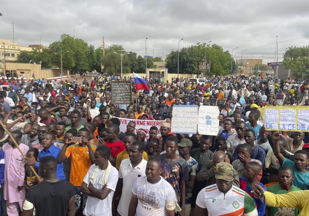 FILE - Supporters of Niger's ruling junta gather for a protest called to fight for the country's freedom and push back against foreign interference, in Niamey, Niger, Aug. 3, 2023. Russia has moved some troops onto an airbase in Niger where a small number of U.S. forces remain after most American troops left the base in Niamey, the nation's capital, a U.S. official said Thursday, May 2, 2024. (AP Photo/Sam Mednick, File)