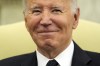 President Joe Biden smiles as he meets with Romania's President Klaus Iohannis in the Oval Office of the White House, Tuesday, May 7, 2024, in Washington. (AP Photo/Alex Brandon)