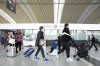 A new survey says Air Canada ranked below most other major North American airlines on customer satisfaction. People walk through Pearson International Airport in Toronto on Friday, March 10, 2023. THE CANADIAN PRESS/Nathan Denette