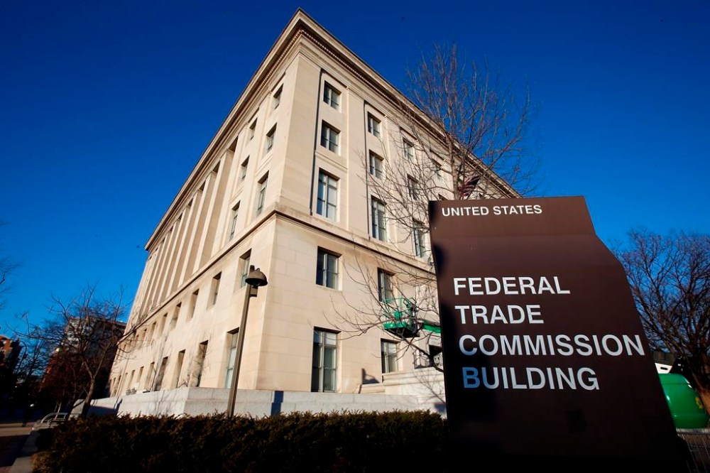 FILE - The Federal Trade Commission building is seen, Jan. 28, 2015, in Washington. Many current and former BetterHelp customers have begun receiving refund eligibility notices spanning from a $7.8 million settlement reached with the online therapy provider last year over allegations that it shared sensitive health data with advertisers. In 2023, the U.S. Federal Trade Commission charged California-based BetterHelp with disclosing consumer data it had promised to keep private — including information about mental health challenges — with companies like Facebook and Snapchat for advertising purposes. (AP Photo/Alex Brandon, File)