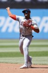 Detroit Tigers second base Andy Ibáñez throws out Cleveland Guardians' Andrés Giménez at first base during the third inning of a baseball game, Wednesday, May 8, 2024, in Cleveland. (AP Photo/Ron Schwane)