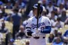 Los Angeles Dodgers designated hitter Shohei Ohtani steps up to bat during the first inning of a baseball game against the Miami Marlins Wednesday, May 8, 2024, in Los Angeles. (AP Photo/Mark J. Terrill)