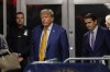 Former President Donald Trump, followed by his attorney Todd Blanche, walks to speak to reporters following the day's proceedings in his trial, Tuesday, May 7, 2024, in New York. (Sarah Yenesel/Pool Photo via AP)