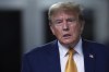 Former President Donald Trump talks reporters following the day's proceedings in his trial, Tuesday, May 7, 2024, in New York. (Win McNamee/Pool Photo via AP)