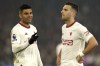 Manchester United's Casemiro, left, and Manchester United's Diogo Dalot react disappointed after the English Premier League soccer match between Crystal Palace and Manchester United at Selhurst Park stadium in London, England, Monday, May 6, 2024. (AP Photo/Ian Walton)