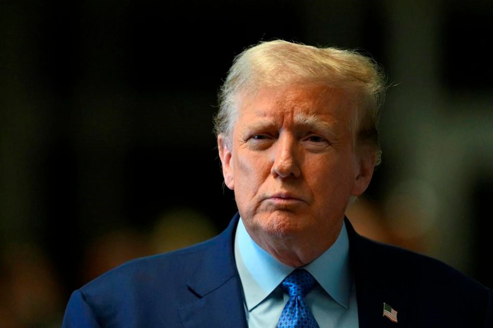 Former President Donald Trump speaks to reporters at Manhattan Criminal Court in New York, Thursday, May 9, 2024. (Angela Weiss/Pool Photo via AP)