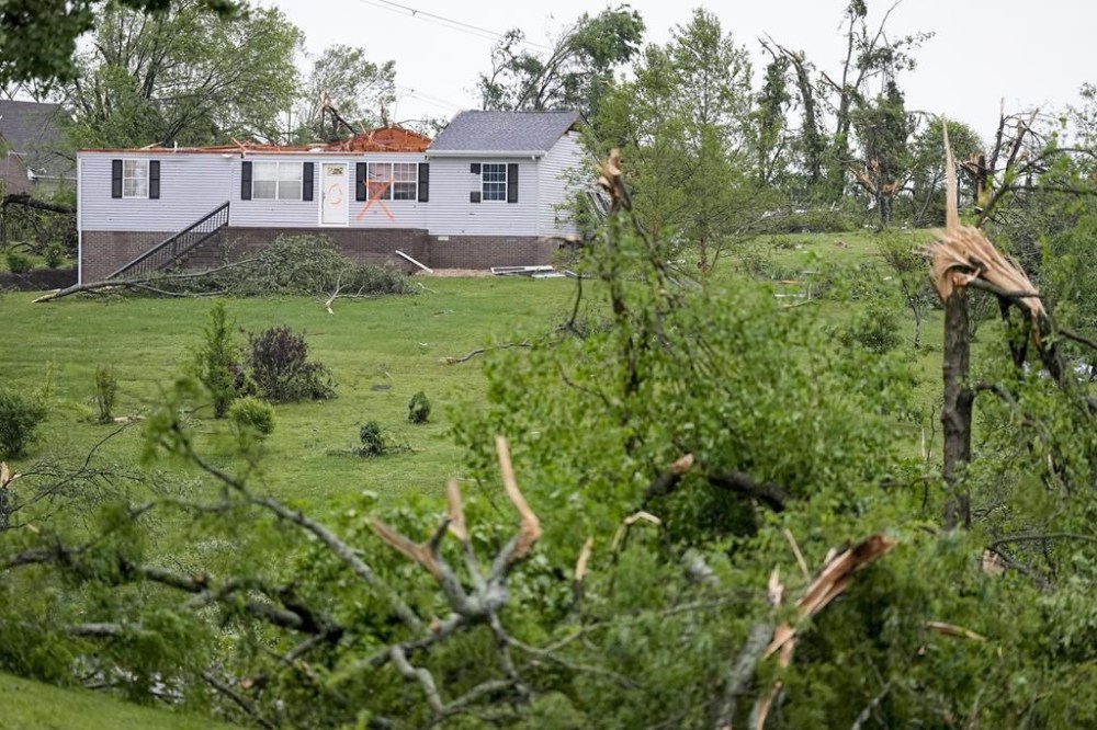 A storm damaged house is seen along Clara Mathis Road, Thursday, May 9, 2024, in Columbia, Tenn. Severe storms tore through the central and southeast U.S., Wednesday, spawning damaging tornadoes, producing massive hail, and killing two people in Tennessee. (AP Photo/George Walker IV)