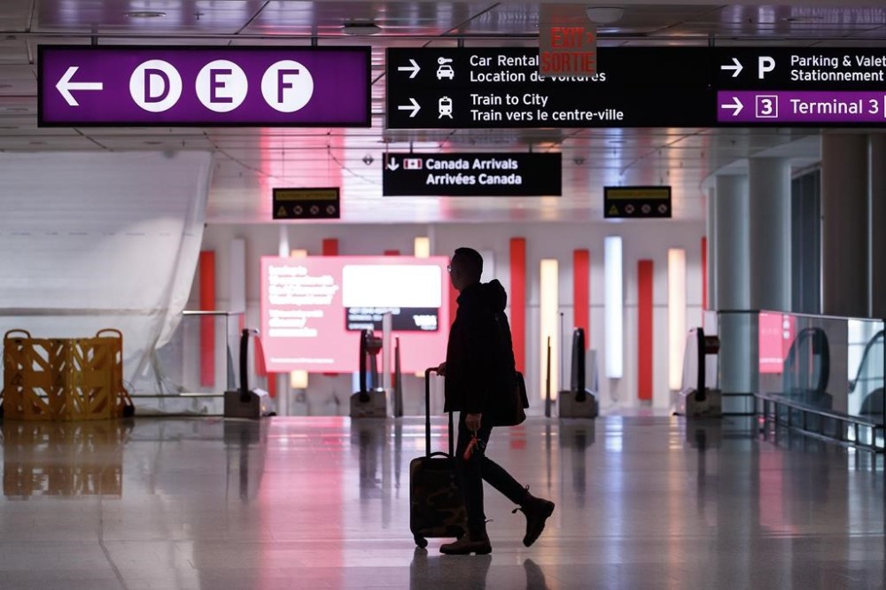 A traveller makes their way through Pearson International Airport in Toronto Monday, Nov. 14, 2022. Disability advocates, government officials and representatives of the airline industry are discussing air travel accessibility at a summit in Ottawa.
THE CANADIAN PRESS/Cole Burston