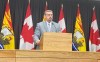 New Brunswick Education and Early Childhood Development Minister Bill Hogan addresses a news conference in Fredericton, Thursday, Dec.15, 2022. Hogan says his threat to dissolve school districts that don’t adhere to the province’s policy change affecting LGBTQ students also extends to francophone school boards. THE CANADIAN PRESS/Hina Alam
