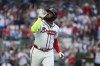 Atlanta Braves' Marcell Ozuna (20) reacts after hitting a three-run home run against the Boston Red Sox during the first inning of a baseball game Wednesday, May 8, 2024, in Atlanta. (Jason Getz/Atlanta Journal-Constitution via AP)