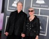FILE - Musician Brian Wilson, left, and his wife Melinda Ledbetter Wilson arrive at the 55th annual Grammy Awards on Sunday, Feb. 10, 2013, in Los Angeles. A judge found Thursday that Beach Boys founder and music luminary Brian Wilson should be in a court conservatorship to manage his personal and medical decisions because of what his doctor calls a “major neurocognitive disorder.” (Photo by Jordan Strauss/Invision/AP, File)