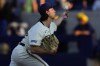 FILE - Milwaukee Brewers pitcher Robert Gasser throws to a San Francisco Giants batter during the first inning of a spring training baseball game March 21, 2024, in Phoenix. Gasser, who joined the Brewers organization in the 2022 trade that sent star closer Josh Hader to San Diego, is expected to start Friday, May 10, against the St. Louis Cardinals in his major league debut. (AP Photo/Matt York, File)