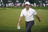 Rory McIlroy, of Northern Ireland, walks off after completing the first round of the Wells Fargo Championship golf tournament at Quail Hollow on Thursday, May 9, 2024, in Charlotte, N.C. (AP Photo/Erik Verduzco)