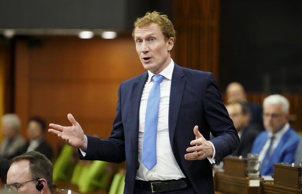 Immigration, Refugees and Citizenship Minister Marc Miller rises in the House of Commons during question period on Parliament Hill in Ottawa on Friday, May 3, 2024. THE CANADIAN PRESS/Sean Kilpatrick